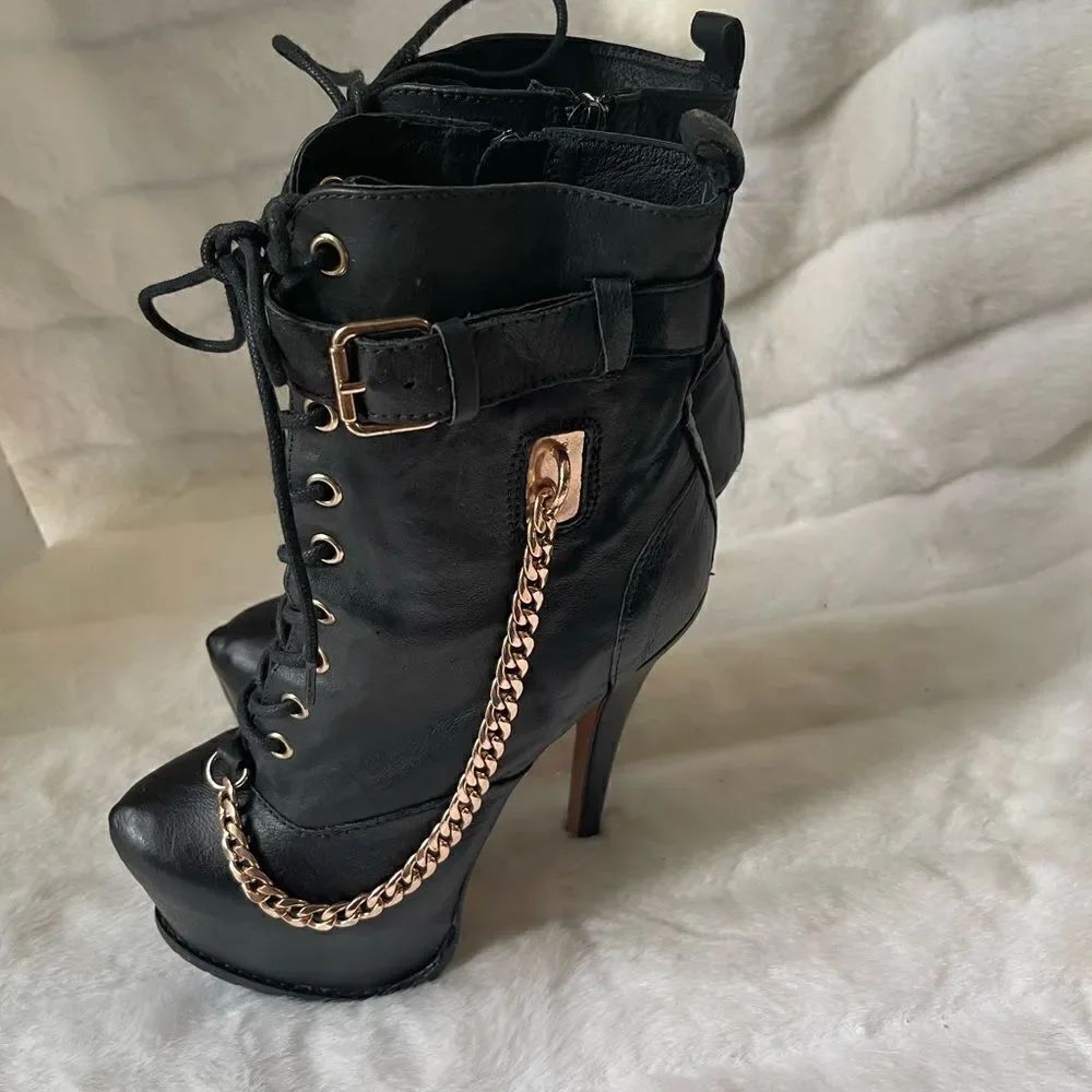 Zigi Girl Leather blk skate  lace up boots with rose gold tone chain acc…